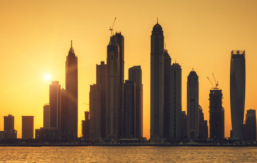 View of Dubai with sun